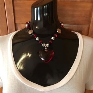 Necklace with red heart pendant